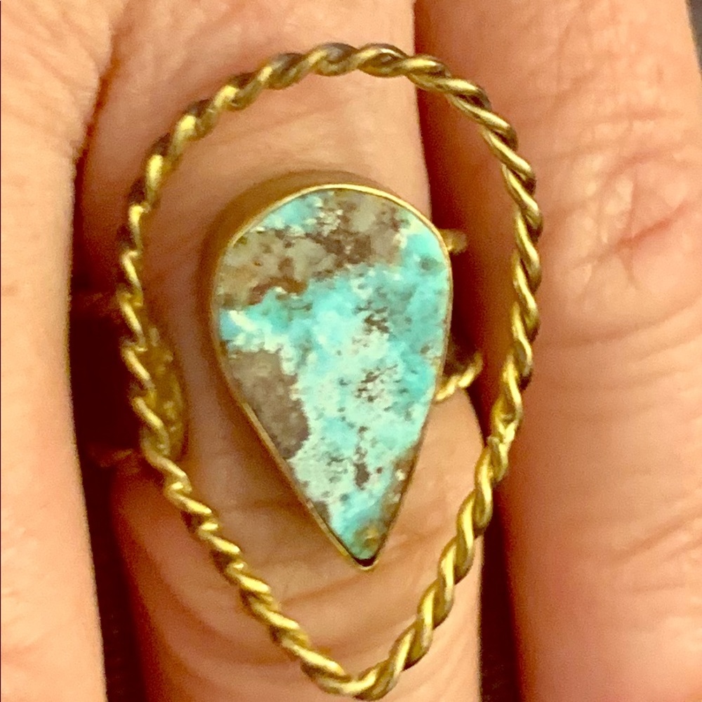 Adjustable turquoise ring.